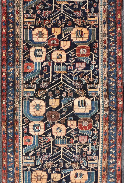 Antique Hamadan Runner in Blue Background Multi Colors With Tribal Motifs. Keivan Woven Arts / rug EMB - 22228 - 15461, country of origin / type: Iran / Hamadan, circa 1920Measures: 3'3 x 9'3 - Keivan Woven ArtsEMB - 22228 - 15461 - 21579Rug