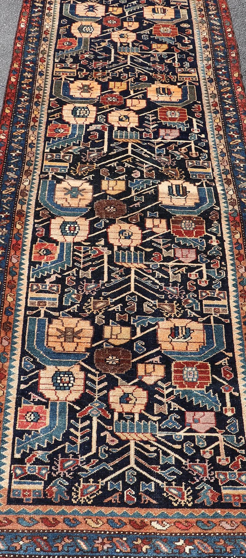 Antique Hamadan Runner in Blue Background Multi Colors With Tribal Motifs. Keivan Woven Arts / rug EMB - 22228 - 15461, country of origin / type: Iran / Hamadan, circa 1920Measures: 3'3 x 9'3 - Keivan Woven ArtsEMB - 22228 - 15461 - 21579Rug