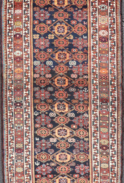 Colorful Antique Persian Lori Runner with Repeating Floral Palmette Design. Keivan Woven Arts / rug EMB - 22229 - 15464, country of origin / type: Iran / Lori, circa 1920 Measures: 3'6 x 11 This antique Persian Lori runner, circa early 20th cent... - Keivan Woven ArtsEMB - 22229 - 15464 - 21585Rug
