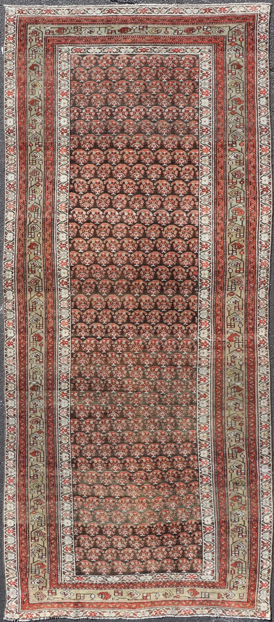 Antique Kurdish Gallery Runner with All - Over Paisley Design in Brown, Red, Green. Keivan Woven Arts / rug EMB - 22230 - 15466, country of origin / type: Iran / Kurdish, circa 1920. Measures: 4'3 x 10'1 This Kurdish gallery runner from early 20th cen... - Keivan Woven ArtsEMB - 22230 - 15466 - 21591