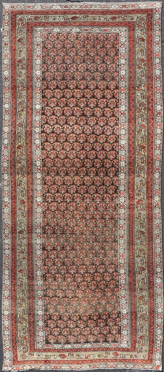 Antique Kurdish Gallery Runner with All - Over Paisley Design in Brown, Red, Green. Keivan Woven Arts / rug EMB - 22230 - 15466, country of origin / type: Iran / Kurdish, circa 1920. Measures: 4'3 x 10'1 This Kurdish gallery runner from early 20th cen... - Keivan Woven ArtsEMB - 22230 - 15466 - 21591