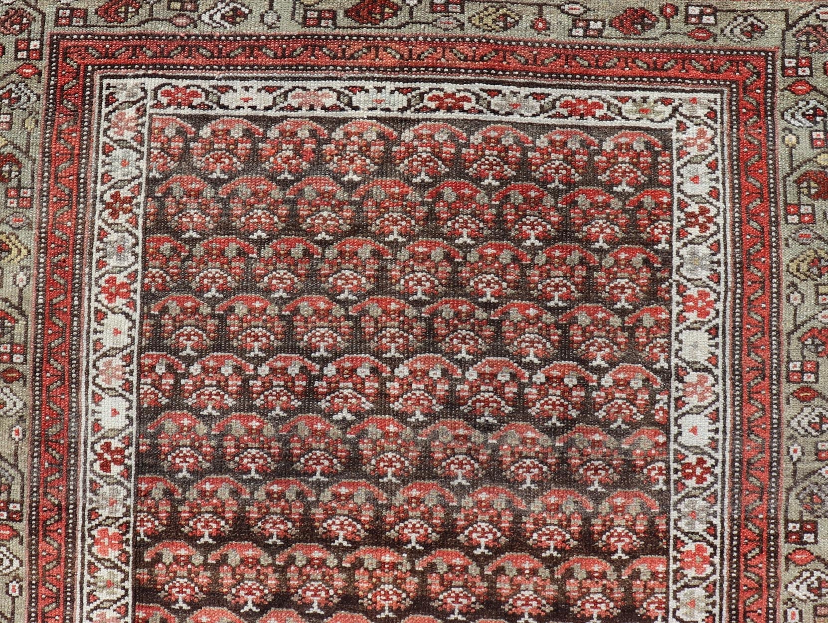Antique Kurdish Gallery Runner with All - Over Paisley Design in Brown, Red, Green. Keivan Woven Arts / rug EMB - 22230 - 15466, country of origin / type: Iran / Kurdish, circa 1920. Measures: 4'3 x 10'1 This Kurdish gallery runner from early 20th cen... - Keivan Woven ArtsEMB - 22230 - 15466 - 21591