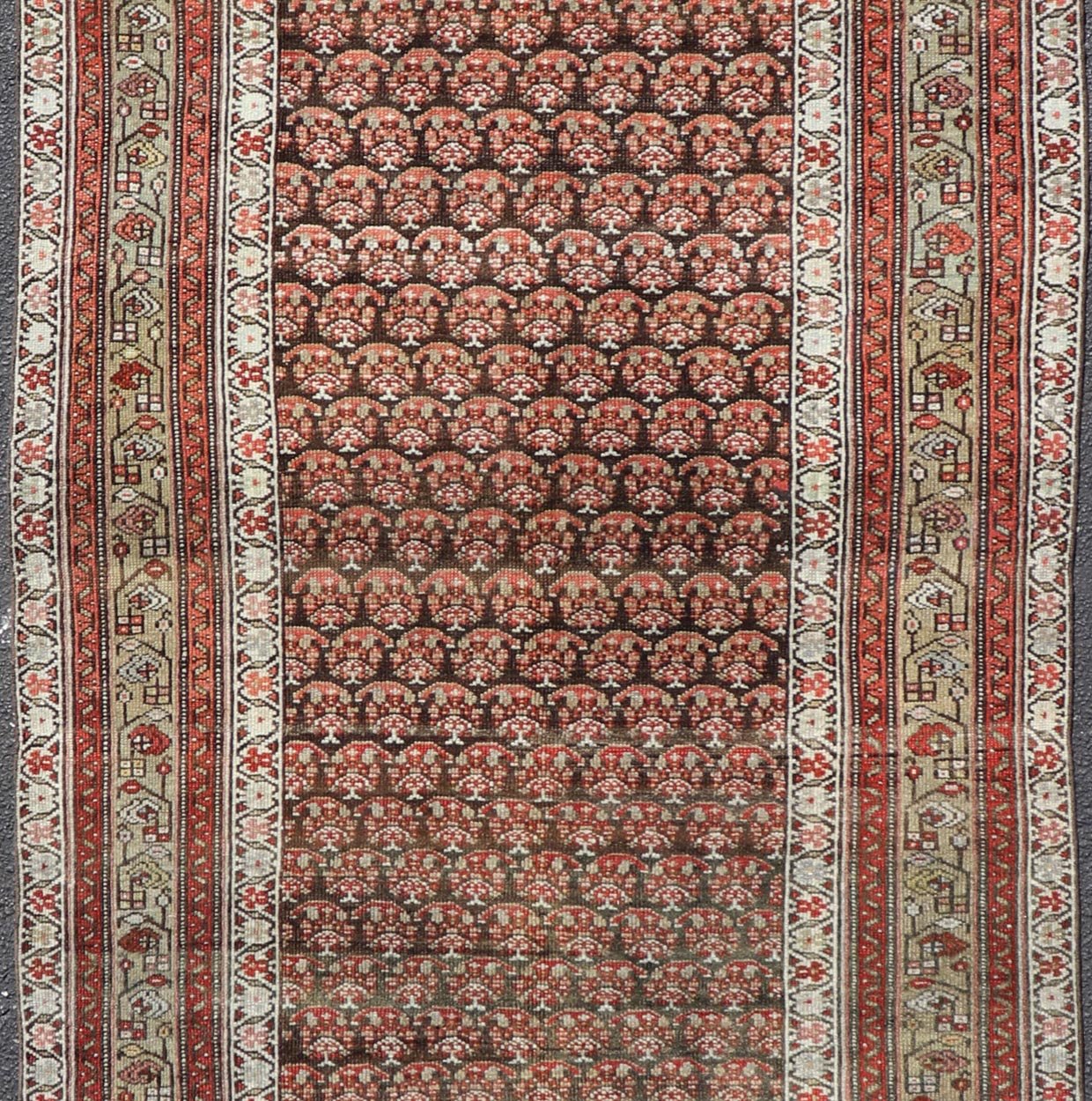 Antique Kurdish Gallery Runner with All - Over Paisley Design in Brown, Red, Green. Keivan Woven Arts / rug EMB - 22230 - 15466, country of origin / type: Iran / Kurdish, circa 1920. Measures: 4'3 x 10'1 This Kurdish gallery runner from early 20th cen... - Keivan Woven ArtsEMB - 22230 - 15466 - 21591