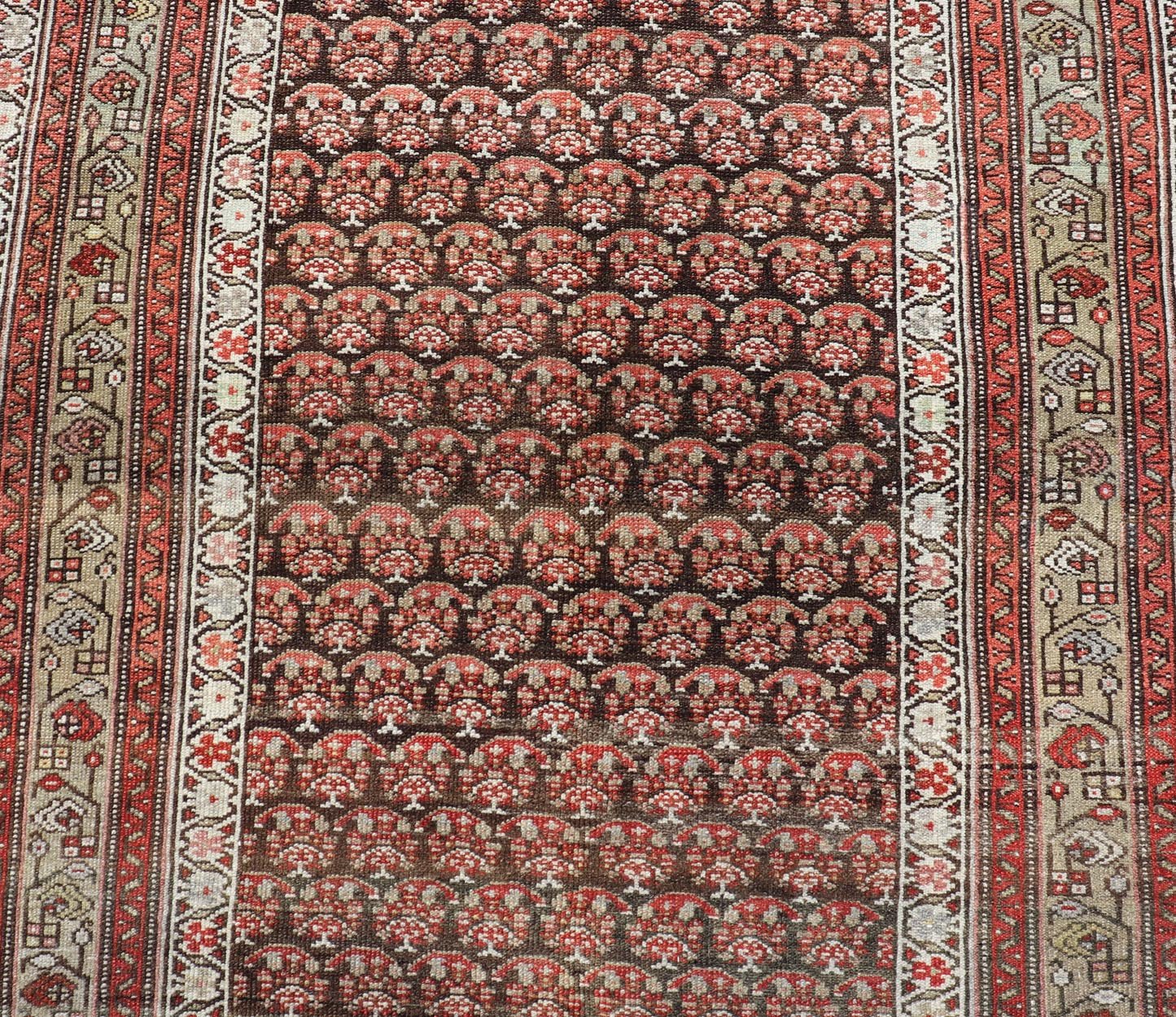 Antique Kurdish Gallery Runner with All - Over Paisley Design in Brown, Red, Green. Keivan Woven Arts / rug EMB - 22230 - 15466, country of origin / type: Iran / Kurdish, circa 1920. Measures: 4'3 x 10'1 This Kurdish gallery runner from early 20th cen... - Keivan Woven ArtsEMB - 22230 - 15466 - 21591