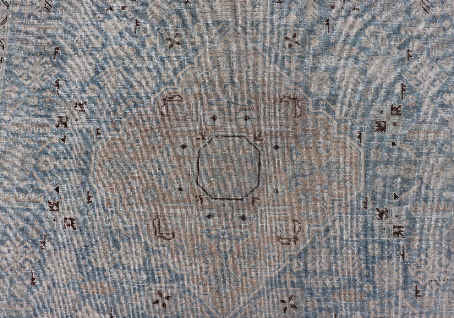 Measures: 6'0 x 9'0 The rug's central field is highlighted by a soft blue background adorned with a detailed medallion pattern in shades of beige and ivory. The design includes various geometric and floral motifs that are arranged symmetrically, cr... - Keivan Woven ArtsEMB - 22236 - 22460