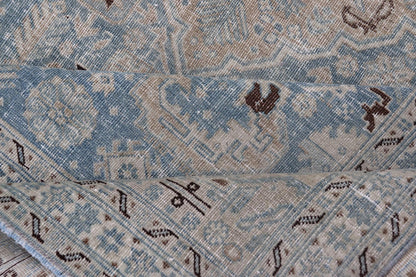 Measures: 6'0 x 9'0 The rug's central field is highlighted by a soft blue background adorned with a detailed medallion pattern in shades of beige and ivory. The design includes various geometric and floral motifs that are arranged symmetrically, cr... - Keivan Woven ArtsEMB - 22236 - 22460Rug