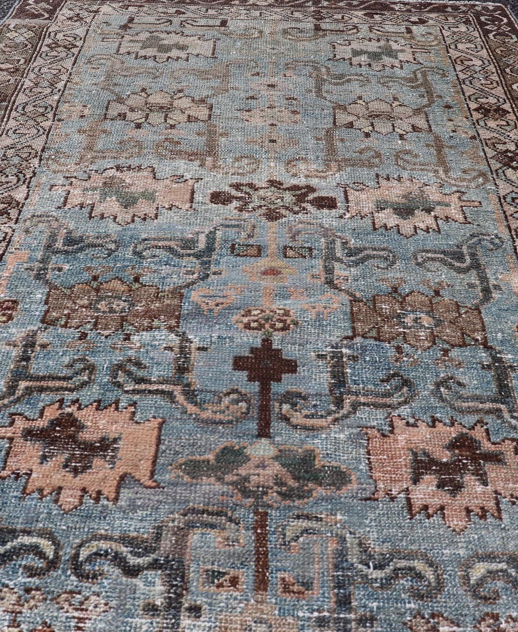 Measures: 2'11 x 4'11 The rug's central field is characterized by a soft blue background with intricate geometric and floral motifs in shades of beige, brown, and cream. The symmetrical patterns include stylized flowers and abstract shapes, creatin... - Keivan Woven ArtsEMB - 22238 - 22472