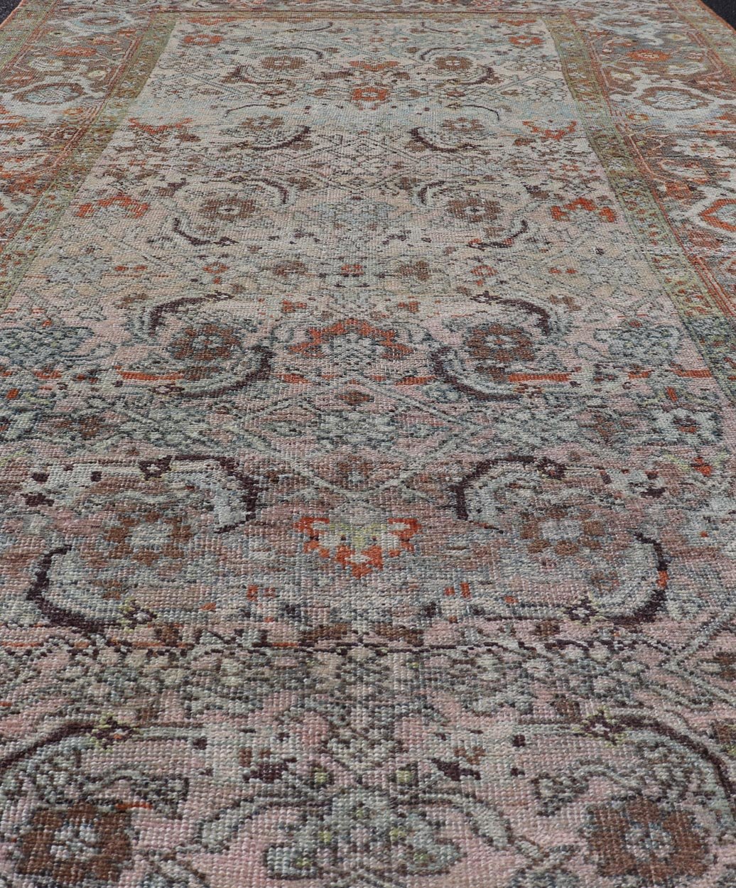 Measures: 4'6 x 8'1 This Bidjar Persian rug, renowned for its durability and intricate design. The rug features a central field with a delicate pattern of floral and geometric motifs in soft, muted colors, including shades of light blue, beige,... - Keivan Woven ArtsEMB - 22243 - 22496Rug