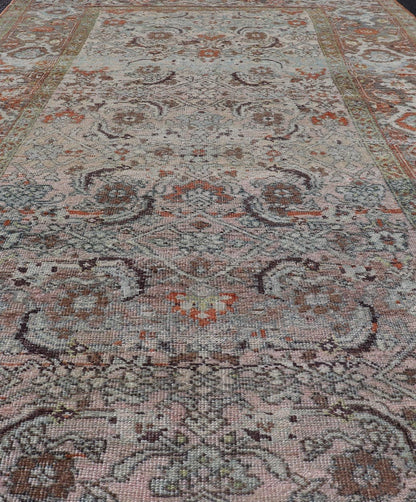 Measures: 4'6 x 8'1 This Bidjar Persian rug, renowned for its durability and intricate design. The rug features a central field with a delicate pattern of floral and geometric motifs in soft, muted colors, including shades of light blue, beige,... - Keivan Woven ArtsEMB - 22243 - 22496Rug