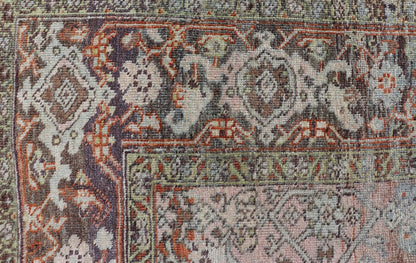 Measures: 4'6 x 8'1 This Bidjar Persian rug, renowned for its durability and intricate design. The rug features a central field with a delicate pattern of floral and geometric motifs in soft, muted colors, including shades of light blue, beige,... - Keivan Woven ArtsEMB - 22243 - 22496Rug