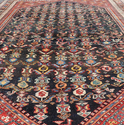 Measures: 5'7 x 8'10 This Qashgai rug has rich heritage and intricate design characteristic of this nomadic tribe from southwestern Iran. The rug features a dense, dark blue field adorned with a myriad of vibrant, detailed motifs, including ani... - Keivan Woven ArtsEMB - 22245 - 22508