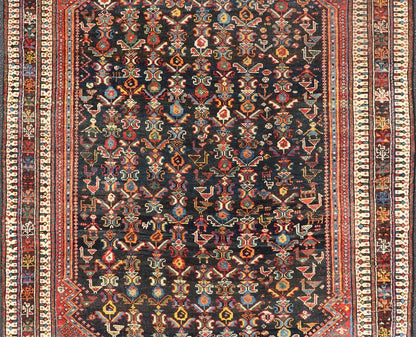 Measures: 5'7 x 8'10 This Qashgai rug has rich heritage and intricate design characteristic of this nomadic tribe from southwestern Iran. The rug features a dense, dark blue field adorned with a myriad of vibrant, detailed motifs, including ani... - Keivan Woven ArtsEMB - 22245 - 22508