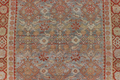 Measures: 4'3 x 7'5 This exquisite Antique Bidjar rug exemplifies the grandeur and meticulous craftsmanship synonymous with one of the most durable Persian carpets. The rug features a harmonious blend of sky blue and rusty red hues, providing a stu... - Keivan Woven ArtsEMB - 22246 - 22514Rug