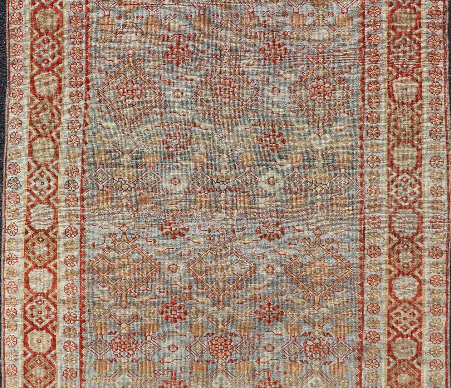 Measures: 4'3 x 7'5 This exquisite Antique Bidjar rug exemplifies the grandeur and meticulous craftsmanship synonymous with one of the most durable Persian carpets. The rug features a harmonious blend of sky blue and rusty red hues, providing a stu... - Keivan Woven ArtsEMB - 22246 - 22514Rug