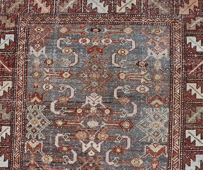 Measures: 3'1 x 9'10 This distinguished antique runner rug hails from the Northwest region of Persia, crafted in the early 20th century. The rug features a captivating central field adorned with intricate geometric and floral motifs in a palette of... - Keivan Woven ArtsEMB - 22257 - 22562