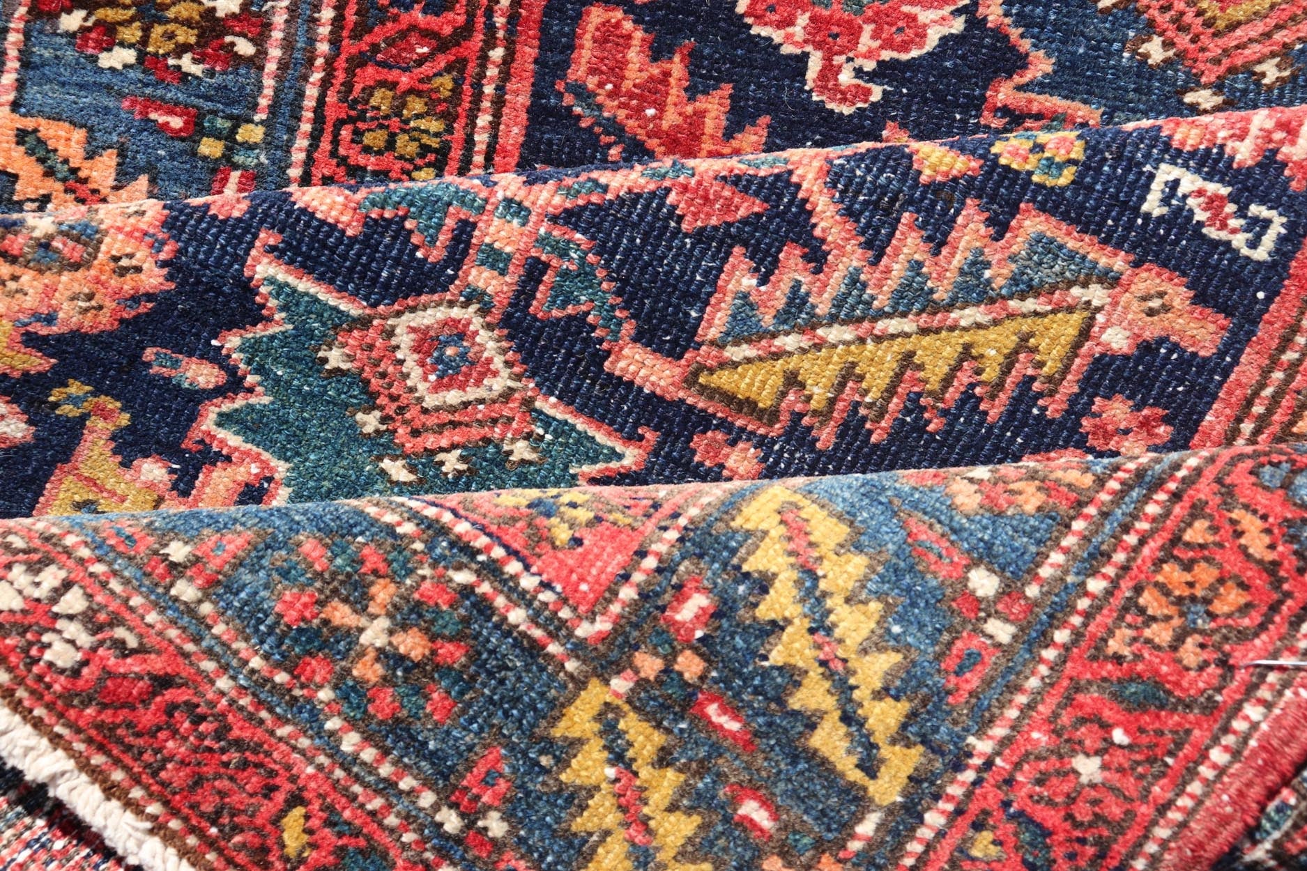 Measures: 3'9 x 11'3 This stunning Serapi runner, an exceptional example of Persian weaving, displays a vibrant and intricate design characteristic of the Serapi style known for its sophistication and complexity. The rug features a rich, dark blue ... - Keivan Woven ArtsEMB - 22258 - 22568
