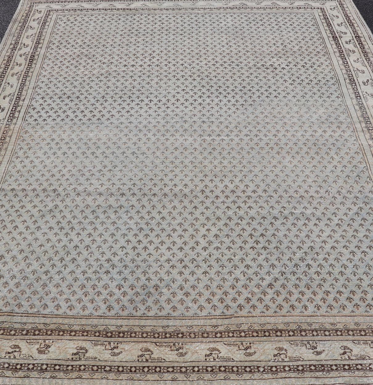 Measures: 7'2 x 10'2 This antique Tabriz rug is a masterpiece of subtlety and sophistication, showcasing the refined artistry and meticulous craftsmanship characteristic of Tabriz weaving. The rug's central field is adorned with a densely patterned... - Keivan Woven ArtsEMB - 22278 - 25890Rug