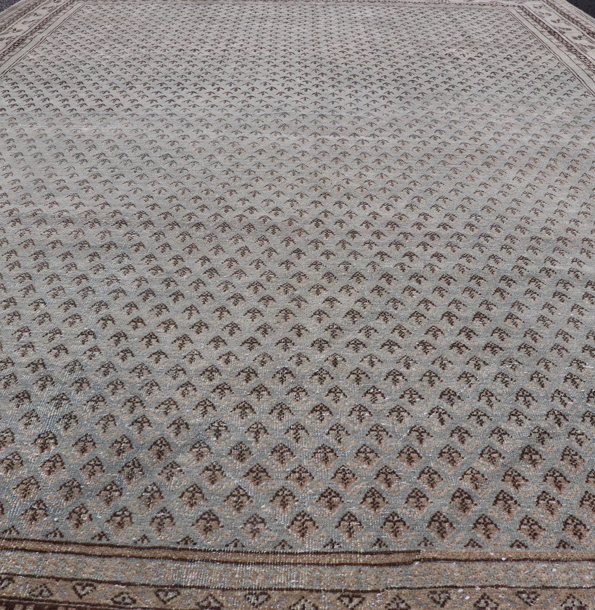 Measures: 7'2 x 10'2 This antique Tabriz rug is a masterpiece of subtlety and sophistication, showcasing the refined artistry and meticulous craftsmanship characteristic of Tabriz weaving. The rug's central field is adorned with a densely patterned... - Keivan Woven ArtsEMB - 22278 - 25890Rug