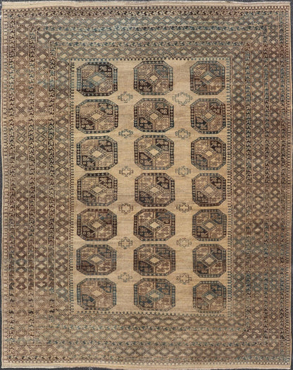 Measures: 8'7 x 11'10 This antique Ersari rug captures the essence of traditional tribal artistry, characterized by its structured array of medallions and rich, earthy tones. The rug features a series of octagonal medallions aligned in a formal, or... - Keivan Woven ArtsEMB - 22279 - 26100Rug