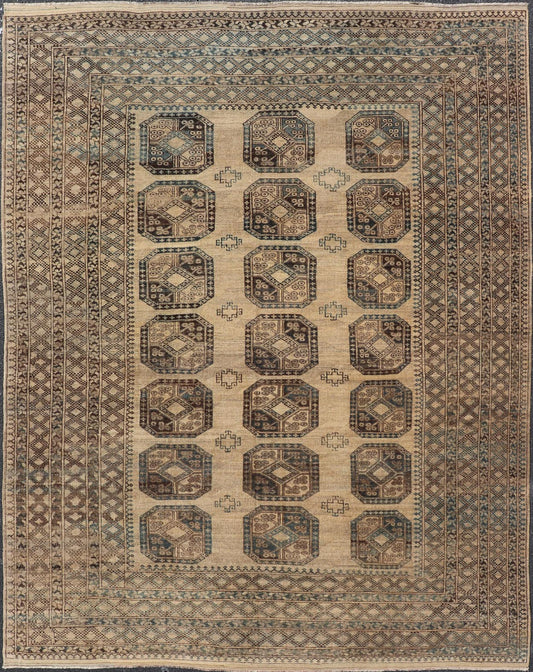 Measures: 8'7 x 11'10 This antique Ersari rug captures the essence of traditional tribal artistry, characterized by its structured array of medallions and rich, earthy tones. The rug features a series of octagonal medallions aligned in a formal, or... - Keivan Woven ArtsEMB - 22279 - 26100Rug