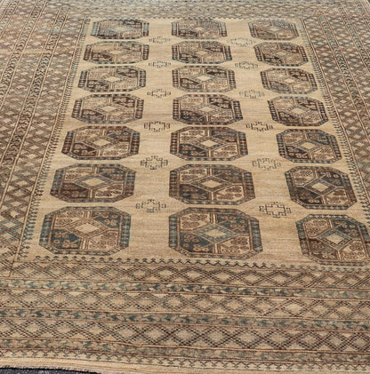 Measures: 8'7 x 11'10 This antique Ersari rug captures the essence of traditional tribal artistry, characterized by its structured array of medallions and rich, earthy tones. The rug features a series of octagonal medallions aligned in a formal, or... - Keivan Woven ArtsEMB - 22279 - 26100Rug