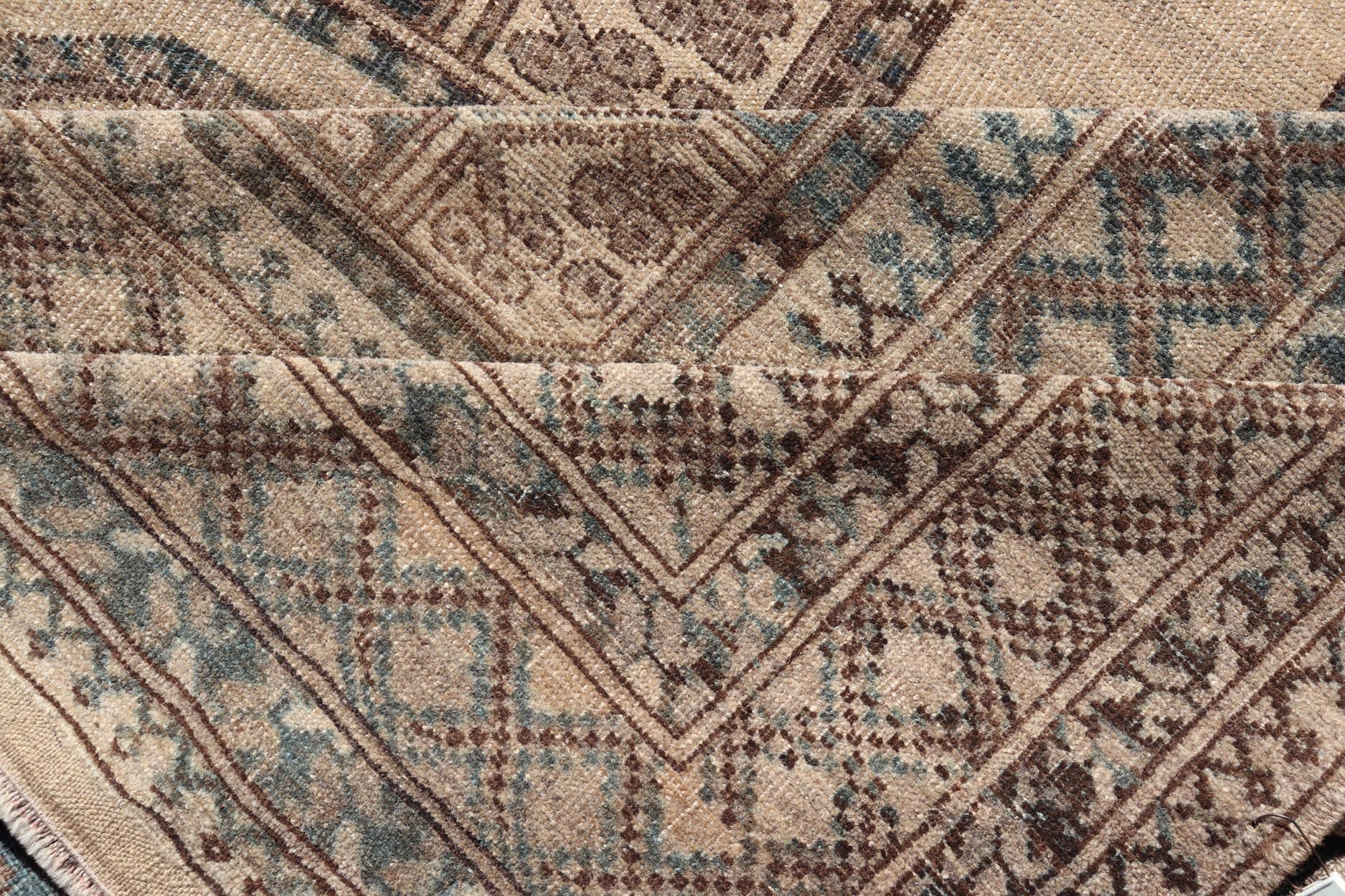 Measures: 8'7 x 11'10 This antique Ersari rug captures the essence of traditional tribal artistry, characterized by its structured array of medallions and rich, earthy tones. The rug features a series of octagonal medallions aligned in a formal, or... - Keivan Woven ArtsEMB - 22279 - 26100Rug
