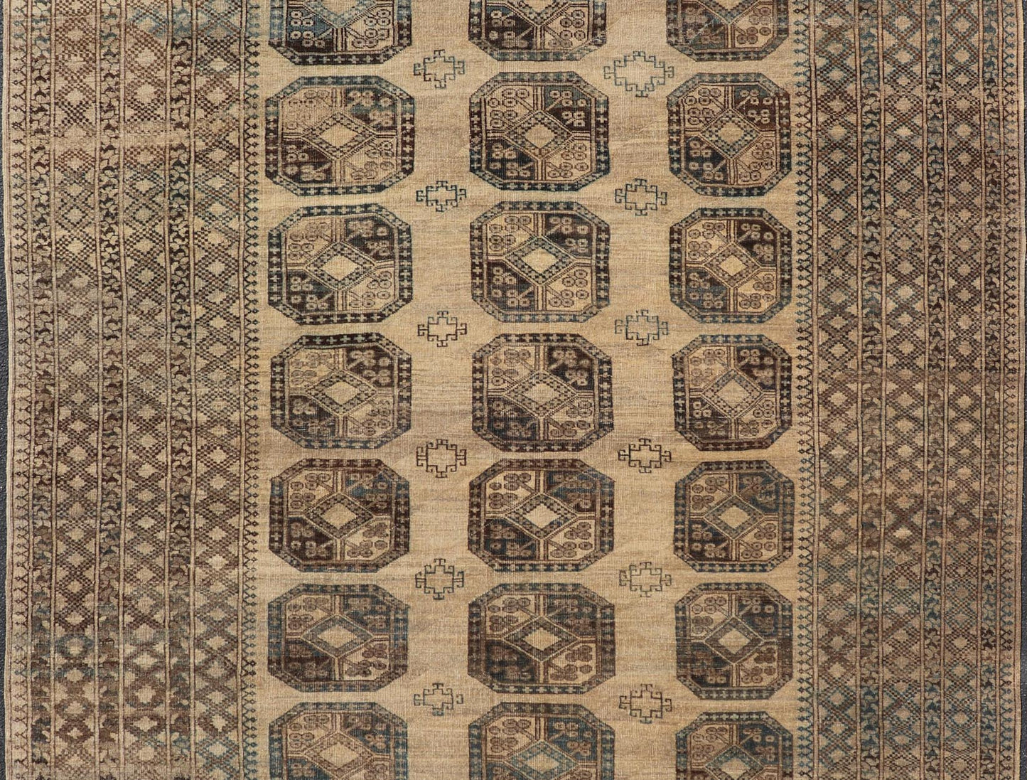 Measures: 8'7 x 11'10 This antique Ersari rug captures the essence of traditional tribal artistry, characterized by its structured array of medallions and rich, earthy tones. The rug features a series of octagonal medallions aligned in a formal, or... - Keivan Woven ArtsEMB - 22279 - 26100Rug