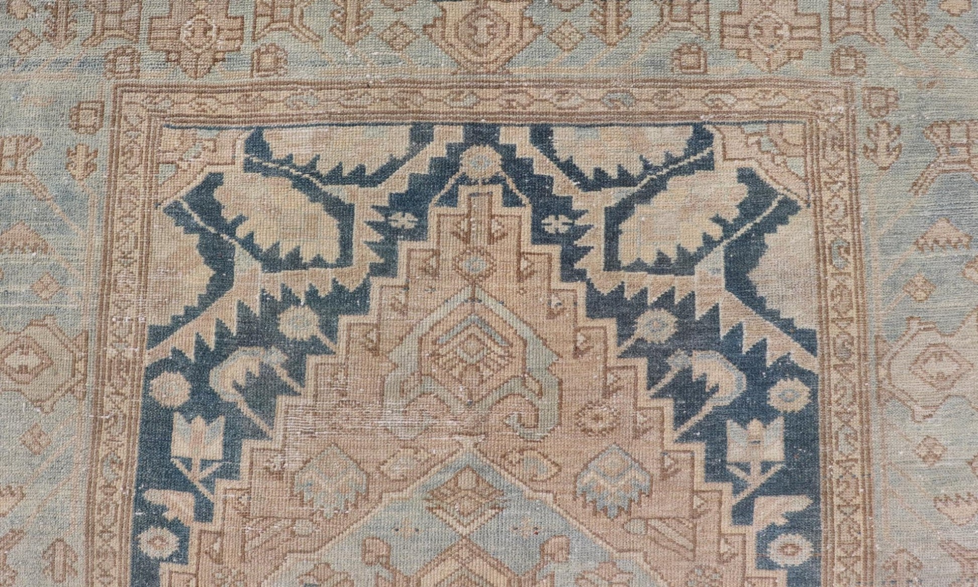 Measures: 4'2 x 6'4 This antique Persian Hamadan rug exemplifies traditional craftsmanship with its bold geometric designs and a harmonious color palette. The rug features a stunning central medallion, highlighted by its intricate detailing and sha... - Keivan Woven ArtsEMB - 22280 - 26190