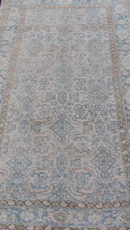 Measures: 3'4 x 6'5 This antique Persian Bidjar rug epitomizes the renowned durability and intricate design characteristic of Bidjar weavings. The rug showcases a complex array of floral and vine motifs intricately woven across its field, presentin... - Keivan Woven ArtsEMB - 22281 - 26766Rug