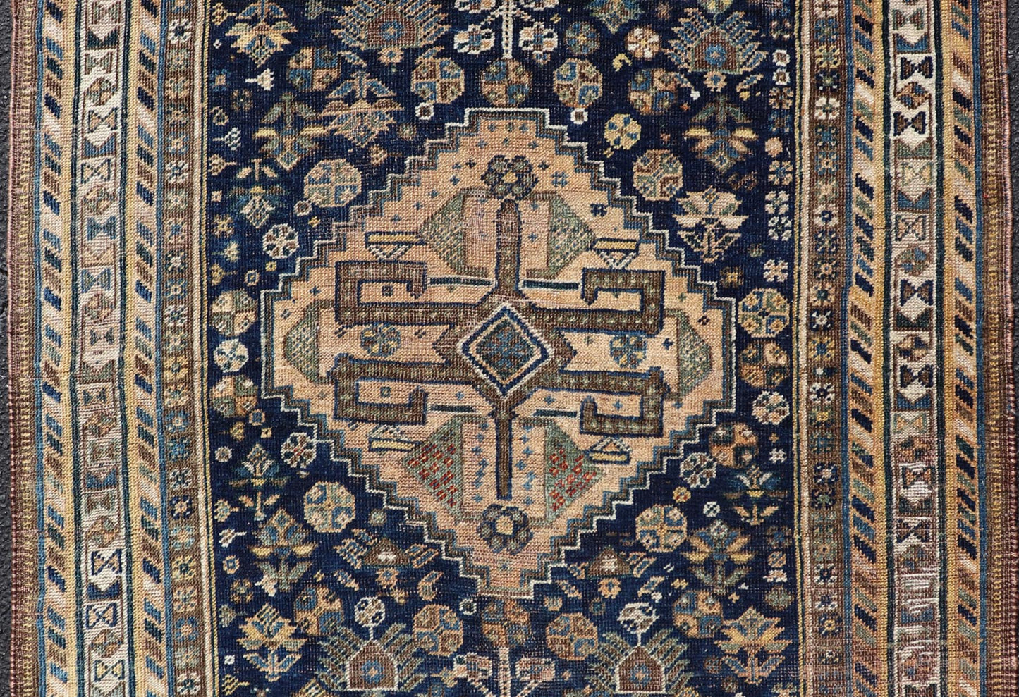 Measures: 3'6 x 5'4 This magnificent antique Persian Shiraz rug is a stunning example of traditional tribal craftsmanship. The rug is dominated by a deep navy field that beautifully contrasts with the rich array of tribal motifs and symbols in vibr... - Keivan Woven ArtsEMB - 22282 - 26106Rug