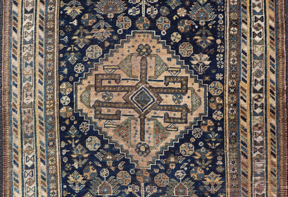 Measures: 3'6 x 5'4 This magnificent antique Persian Shiraz rug is a stunning example of traditional tribal craftsmanship. The rug is dominated by a deep navy field that beautifully contrasts with the rich array of tribal motifs and symbols in vibr... - Keivan Woven ArtsEMB - 22282 - 26106Rug