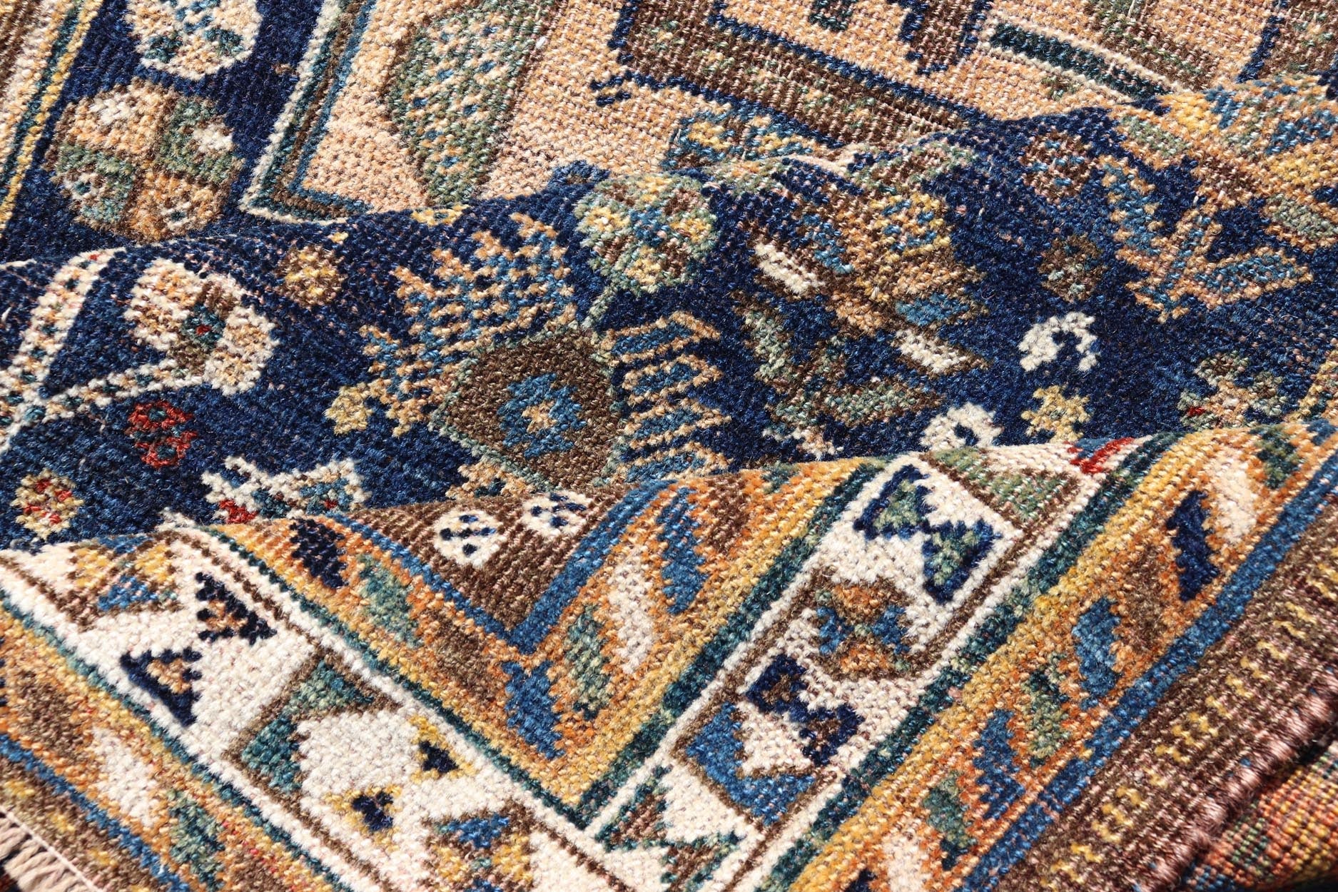 Measures: 3'6 x 5'4 This magnificent antique Persian Shiraz rug is a stunning example of traditional tribal craftsmanship. The rug is dominated by a deep navy field that beautifully contrasts with the rich array of tribal motifs and symbols in vibr... - Keivan Woven ArtsEMB - 22282 - 26106Rug