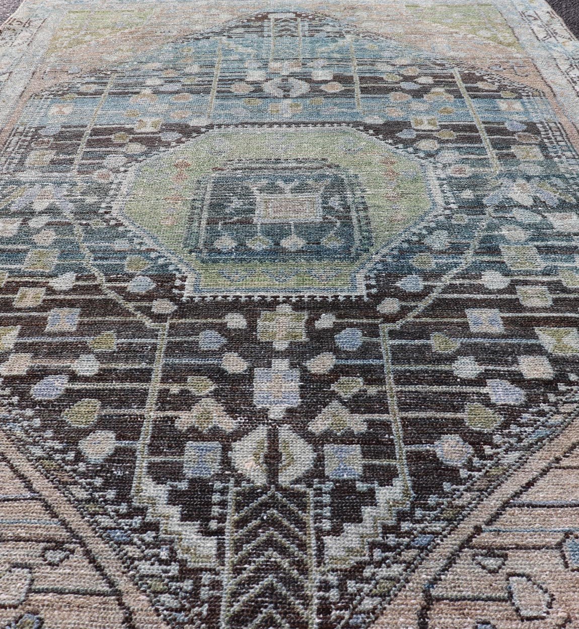 Measures: 4'0 x 6'0 This exquisite antique Persian Nahavand rug showcases the mastery of traditional Persian weaving with its intricate design and sophisticated color palette. Dominated by a central diamond medallion, the rug features layers of geo... - Keivan Woven ArtsEMB - 22284 - 26112Rug