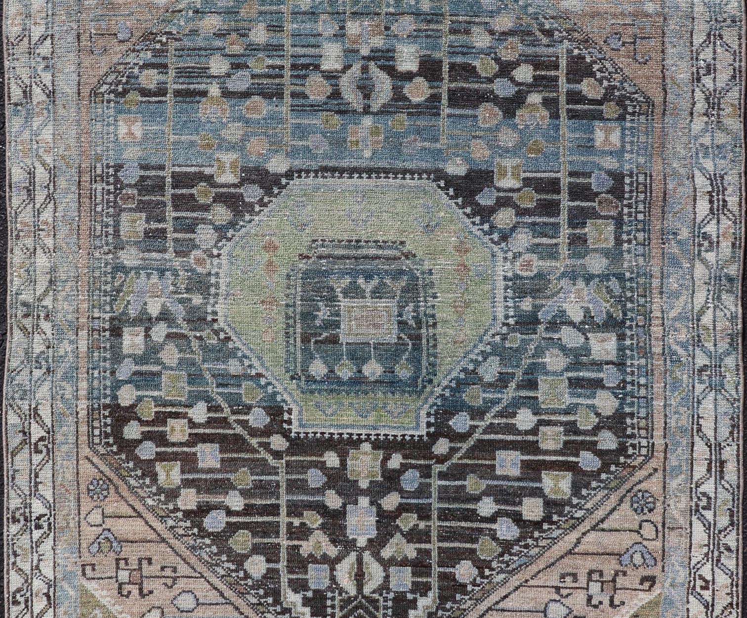 Measures: 4'0 x 6'0 This exquisite antique Persian Nahavand rug showcases the mastery of traditional Persian weaving with its intricate design and sophisticated color palette. Dominated by a central diamond medallion, the rug features layers of geo... - Keivan Woven ArtsEMB - 22284 - 26112Rug