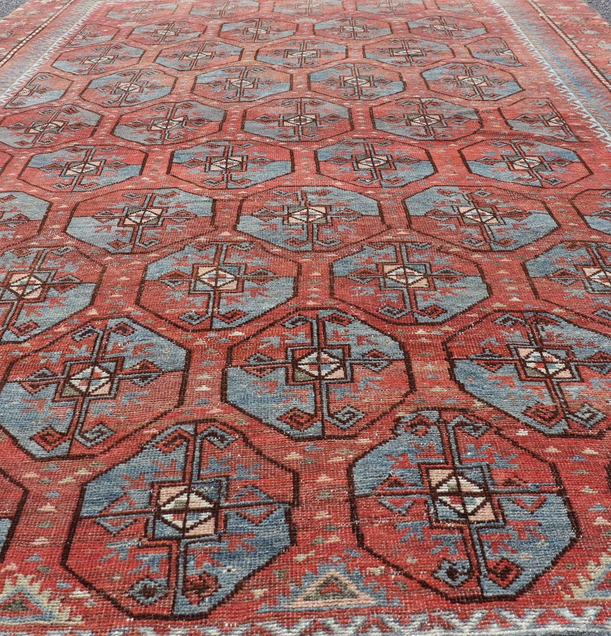 Measures: 5'10 x 8'10 This antique East Turkistan Belouch rug is a stunning representation of traditional craftsmanship, featuring a rich red lattice pattern that is both striking and symbolic. The rug is beautifully ornamented with a network of ge... - Keivan Woven ArtsEMB - 22285 - 25896Rug