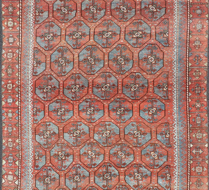 Measures: 5'10 x 8'10 This antique East Turkistan Belouch rug is a stunning representation of traditional craftsmanship, featuring a rich red lattice pattern that is both striking and symbolic. The rug is beautifully ornamented with a network of ge... - Keivan Woven ArtsEMB - 22285 - 25896Rug