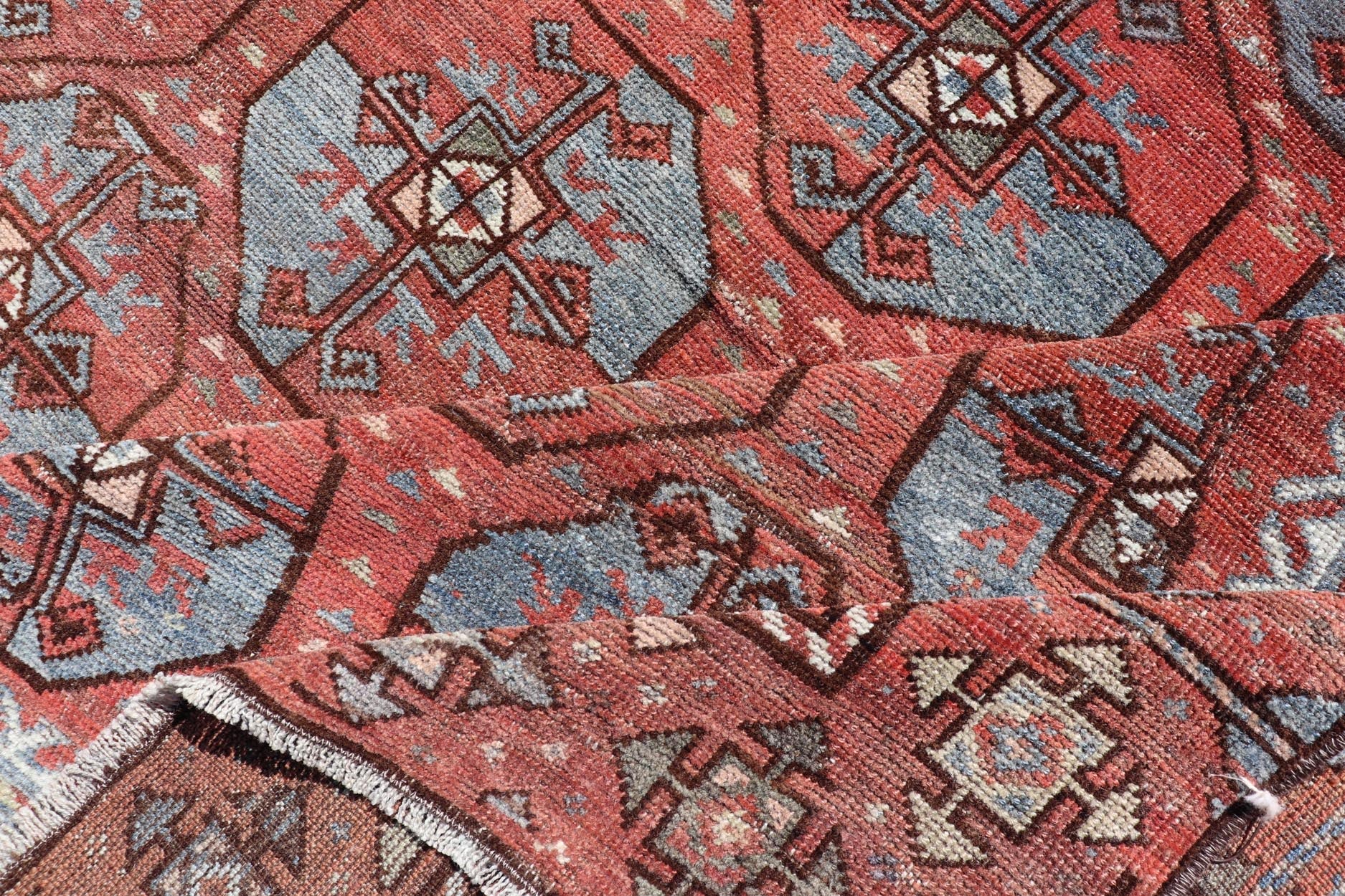 Measures: 5'10 x 8'10 This antique East Turkistan Belouch rug is a stunning representation of traditional craftsmanship, featuring a rich red lattice pattern that is both striking and symbolic. The rug is beautifully ornamented with a network of ge... - Keivan Woven ArtsEMB - 22285 - 25896Rug