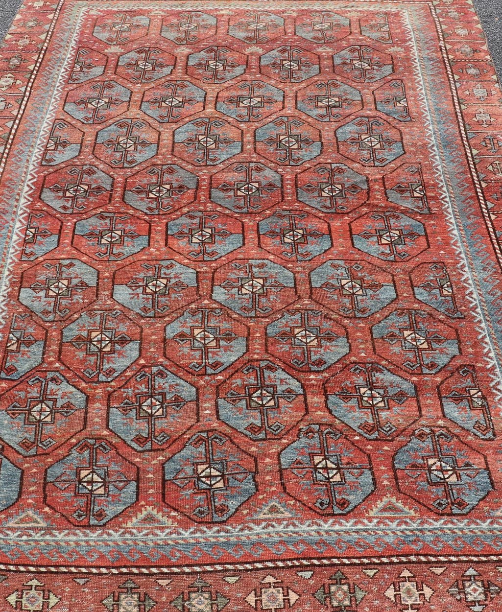 Measures: 5'10 x 8'10 This antique East Turkistan Belouch rug is a stunning representation of traditional craftsmanship, featuring a rich red lattice pattern that is both striking and symbolic. The rug is beautifully ornamented with a network of ge... - Keivan Woven ArtsEMB - 22285 - 25896Rug