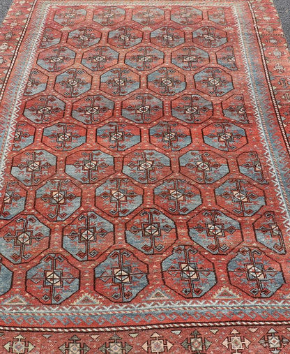 Measures: 5'10 x 8'10 This antique East Turkistan Belouch rug is a stunning representation of traditional craftsmanship, featuring a rich red lattice pattern that is both striking and symbolic. The rug is beautifully ornamented with a network of ge... - Keivan Woven ArtsEMB - 22285 - 25896Rug