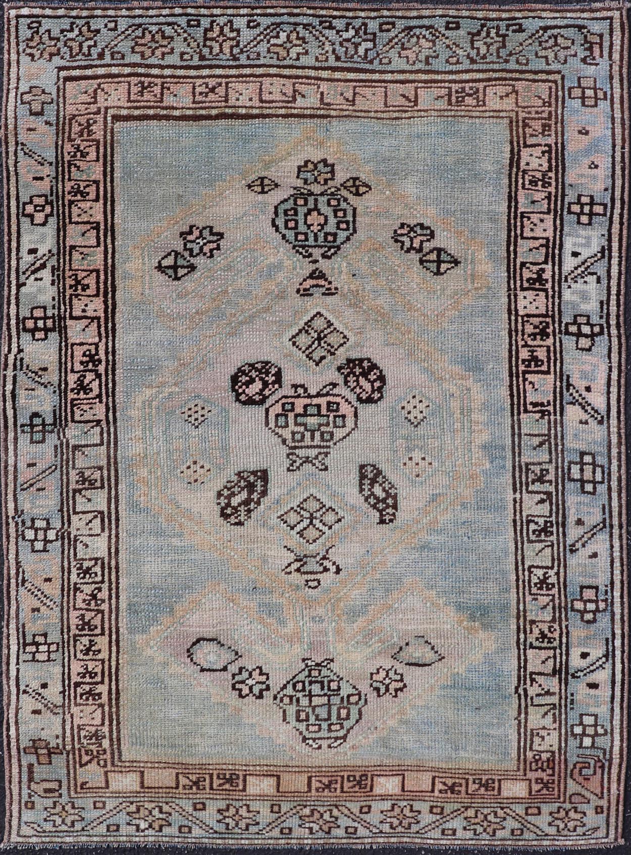 Measures: 3'0 x 4'5 This refined antique Persian Kurdish rug showcases a sophisticated blend of geometric designs and subtle color palette, exemplifying the understated beauty of Kurdish weaving. The rug features a serene light blue field that sets... - Keivan Woven ArtsEMB - 22286 - 26772