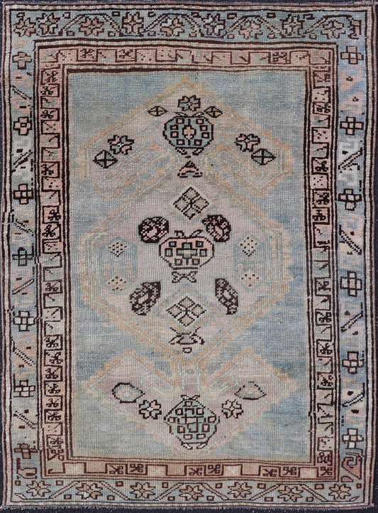 Measures: 3'0 x 4'5 This refined antique Persian Kurdish rug showcases a sophisticated blend of geometric designs and subtle color palette, exemplifying the understated beauty of Kurdish weaving. The rug features a serene light blue field that sets... - Keivan Woven ArtsEMB - 22286 - 26772Rug