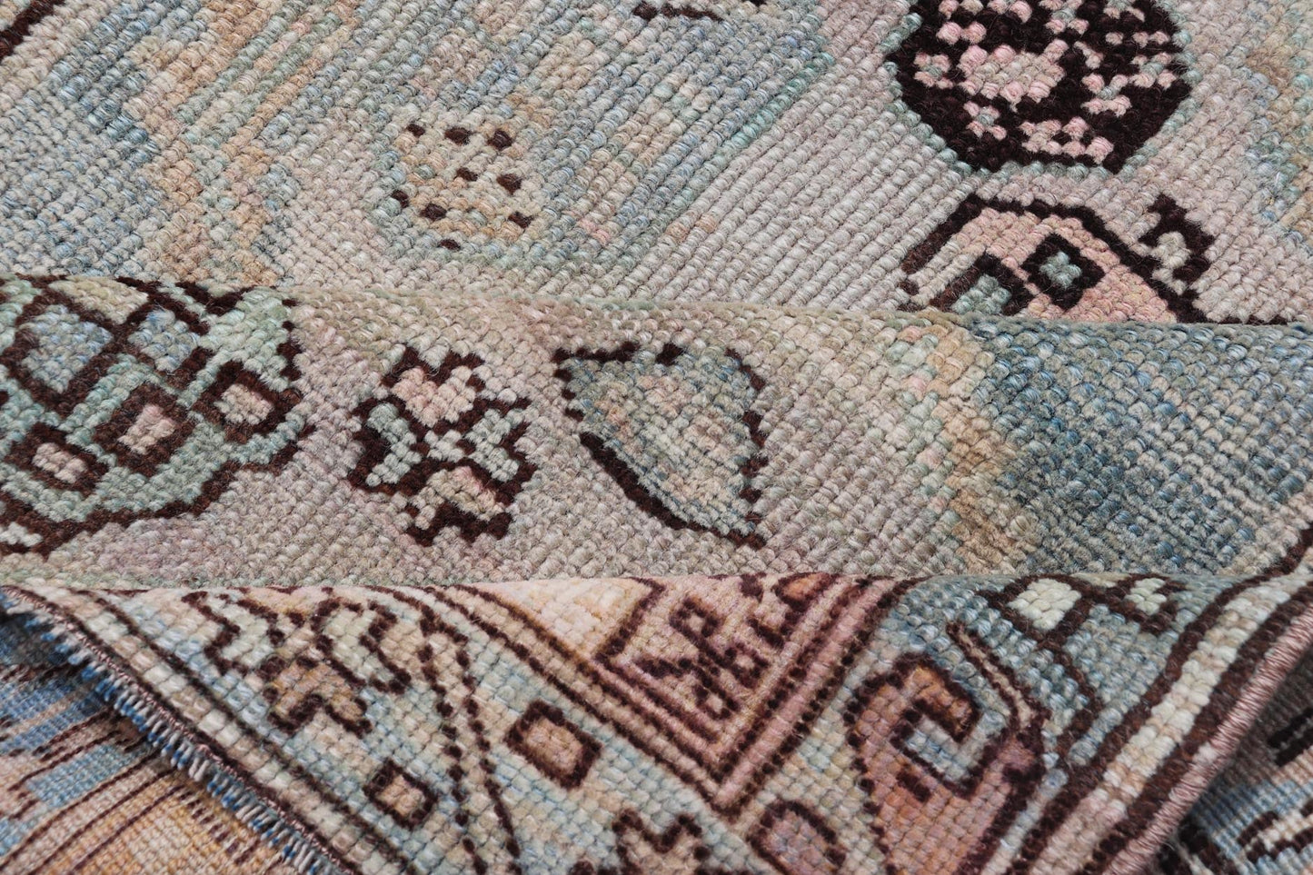 Measures: 3'0 x 4'5 This refined antique Persian Kurdish rug showcases a sophisticated blend of geometric designs and subtle color palette, exemplifying the understated beauty of Kurdish weaving. The rug features a serene light blue field that sets... - Keivan Woven ArtsEMB - 22286 - 26772