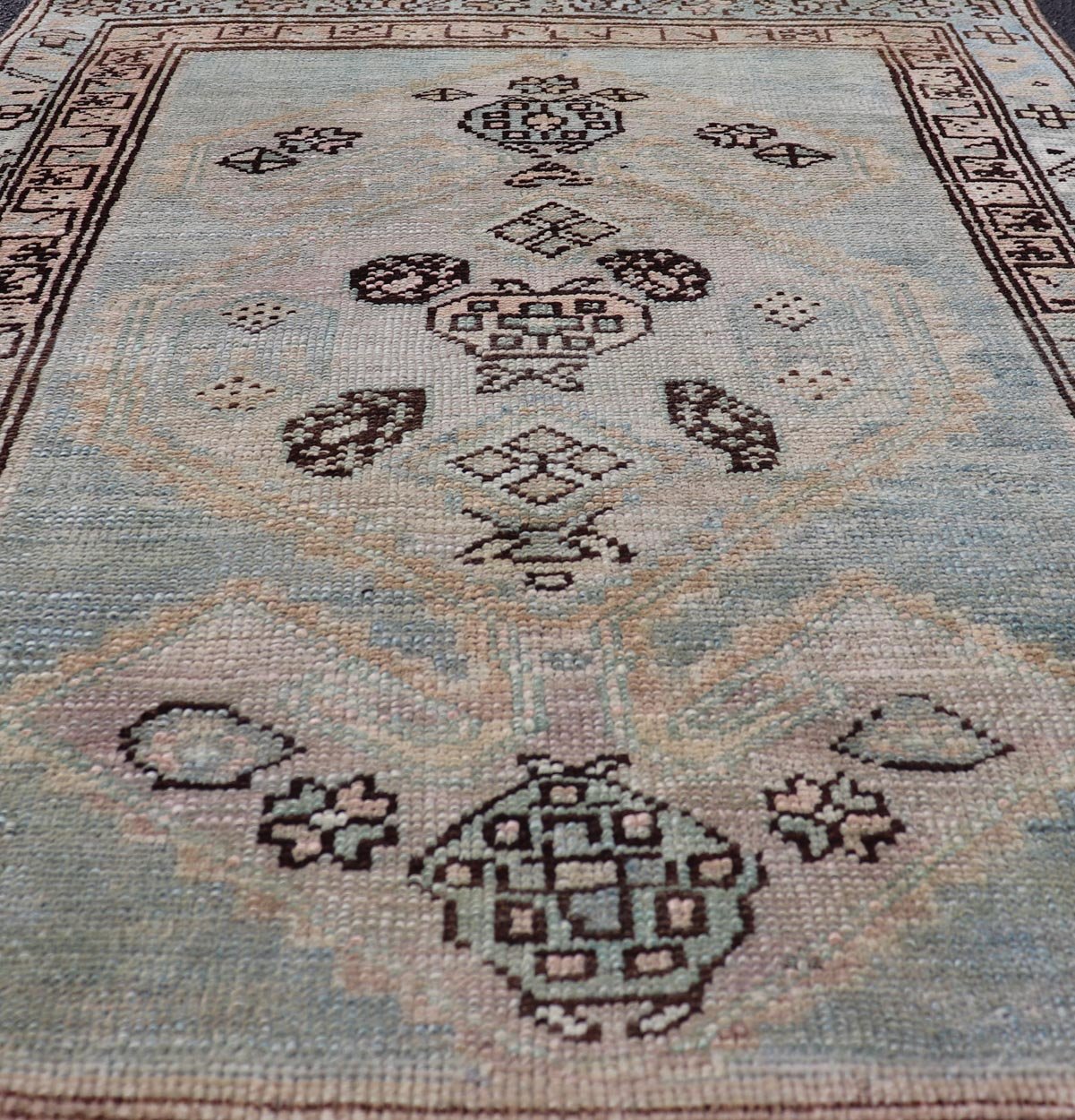 Measures: 3'0 x 4'5 This refined antique Persian Kurdish rug showcases a sophisticated blend of geometric designs and subtle color palette, exemplifying the understated beauty of Kurdish weaving. The rug features a serene light blue field that sets... - Keivan Woven ArtsEMB - 22286 - 26772