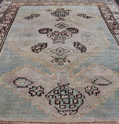 Measures: 3'0 x 4'5 This refined antique Persian Kurdish rug showcases a sophisticated blend of geometric designs and subtle color palette, exemplifying the understated beauty of Kurdish weaving. The rug features a serene light blue field that sets... - Keivan Woven ArtsEMB - 22286 - 26772