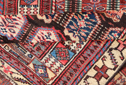 Measures: 3'3 x 8'4 This stunning antique Persian Kurdish runner showcases a vibrant and intricate design, reflecting the rich tribal heritage of Kurdish craftsmanship. The rug features a series of repeated medallions, each intricately detailed wit... - Keivan Woven ArtsEMB - 22288 - 26124Rug