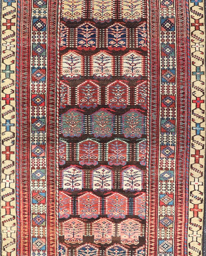 Measures: 3'3 x 8'4 This stunning antique Persian Kurdish runner showcases a vibrant and intricate design, reflecting the rich tribal heritage of Kurdish craftsmanship. The rug features a series of repeated medallions, each intricately detailed wit... - Keivan Woven ArtsEMB - 22288 - 26124Rug
