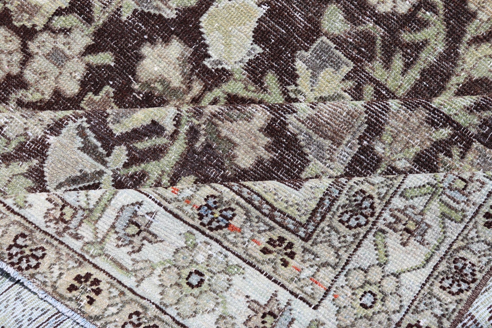 Measures: 4'2 x 5'7 This splendid antique Persian Sultanabad - Mahal rug captures the essence of Persian artistic heritage with its dense floral design and refined aesthetic. Renowned for their rich colors and intricate patterns, Sultanabad - Mahal rug... - Keivan Woven ArtsEMB - 22291 - 26136Rug