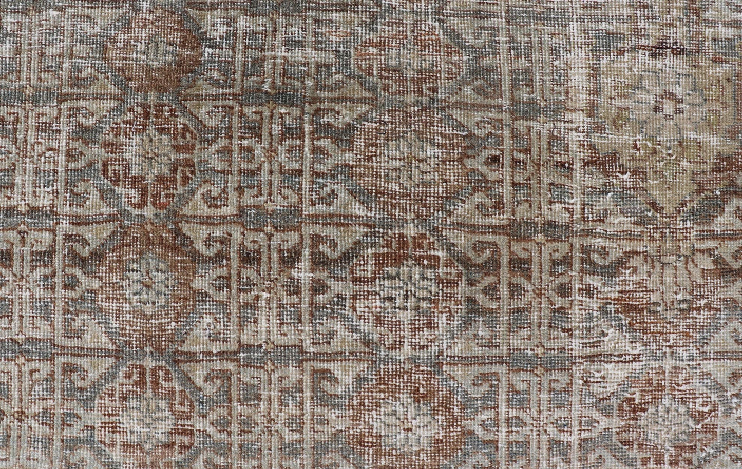 Antique Hand - Knotted Distressed Persian Mahal Rug in Wool with Medallion Design This antique distressed Persian Mahal rug has been hand - knotted in wool and features a large medallion design rendered in muted tones, a complementary, multi - tiered... - Keivan Woven ArtsEMB - 5000 - P13060 - 16406Rug