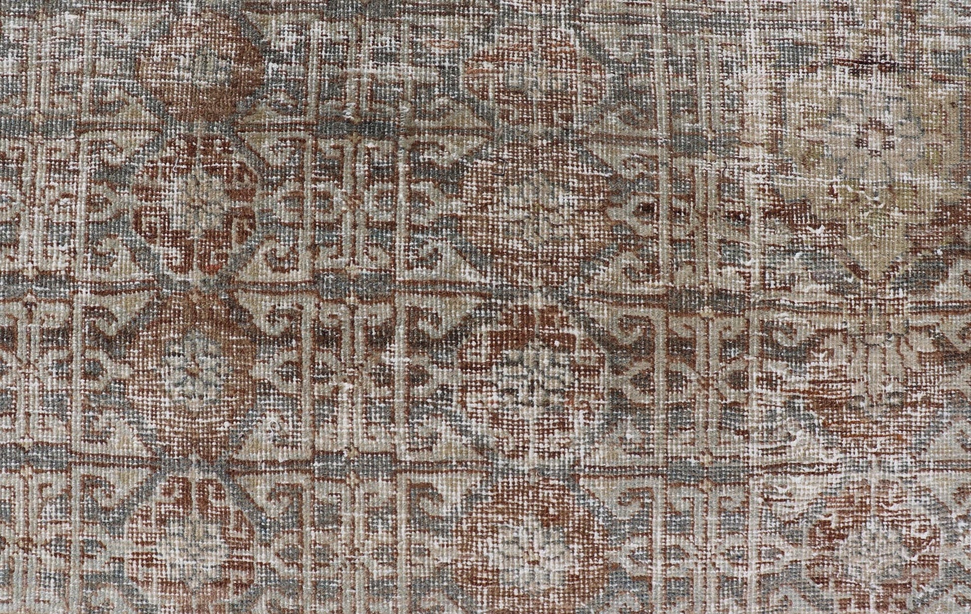 Antique Hand - Knotted Distressed Persian Mahal Rug in Wool with Medallion Design This antique distressed Persian Mahal rug has been hand - knotted in wool and features a large medallion design rendered in muted tones, a complementary, multi - tiered... - Keivan Woven ArtsEMB - 5000 - P13060 - 16406Rug
