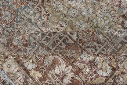 Antique Hand - Knotted Distressed Persian Mahal Rug in Wool with Medallion Design This antique distressed Persian Mahal rug has been hand - knotted in wool and features a large medallion design rendered in muted tones, a complementary, multi - tiered... - Keivan Woven ArtsEMB - 5000 - P13060 - 16406Rug